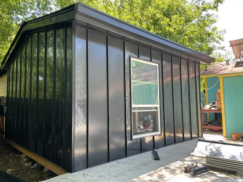 Black standing seam metal wall panels for Metal Roof Installation in West Vero Corridor