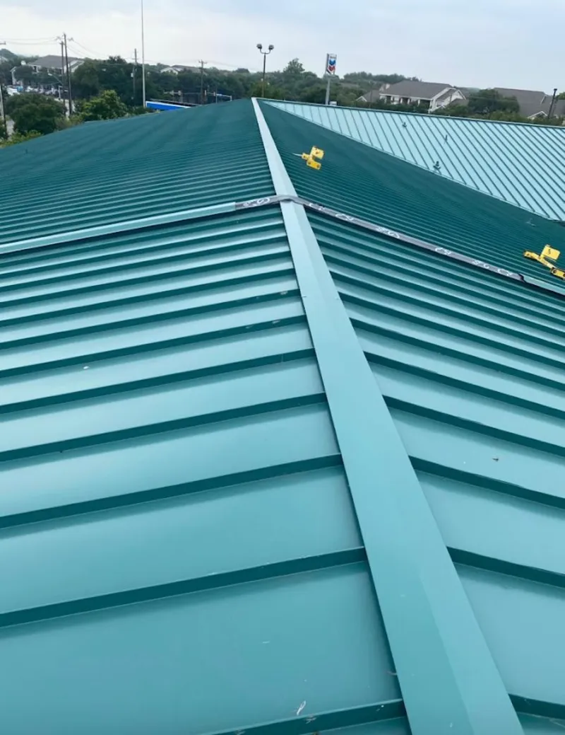 Green commercial metal roof ridge and valley for Metal Roof Repair in West Vero Corridor
